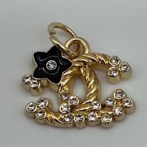 CHANEL Rope CC Crystal Rhinestone Camellia Charm Pull Gold Black Enamel